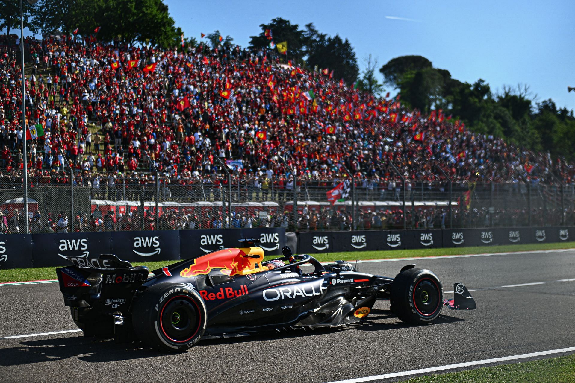 Max Verstappen of the Netherlands driving the (1) Oracle Red Bull Racing RB21 waves to fans on track during the F1 Grand Prix of Emilia-Romagna at Autodromo Internazionale Enzo e Dino Ferrari on May 18, 2025 in Imola, Italy. - Source: Getty